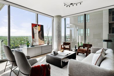 Living room with expansive windows, track lightin