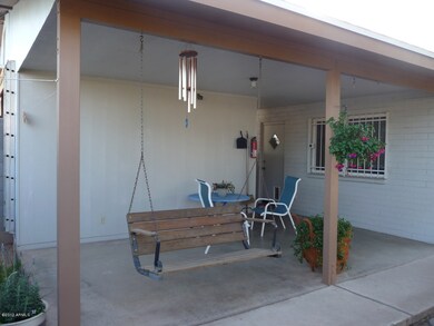 covered patio with swing
