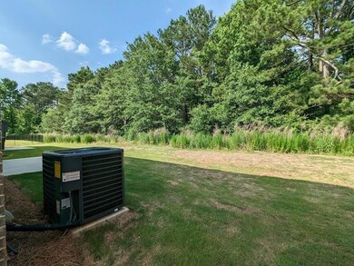 View of yard with central AC unit