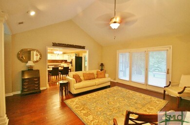 Lovely Open Living Room with new hardwood floors a