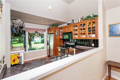 Over-sized windows allow plenty of light to fill t