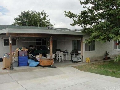 Covered patio in rear yard