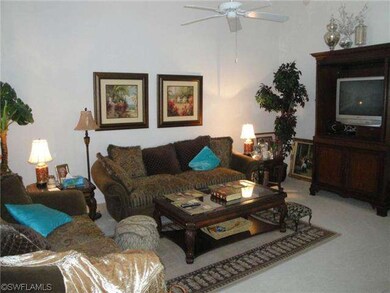Great room with ceiling fan.