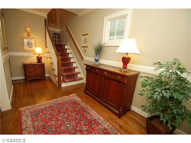 Foyer - Welcoming foyer with random width wood flo