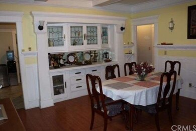 Dinning room with built in leaded glass cabinets