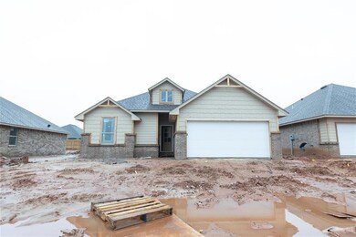 Craftsman-style house featuring brick siding and a