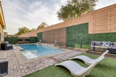 View of pool with a fenced backyard, a fenced in p
