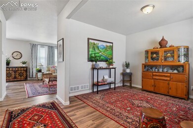 Sitting room or could be an office.