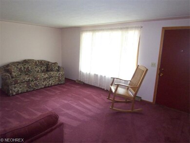 The living room with a huge picture window.
