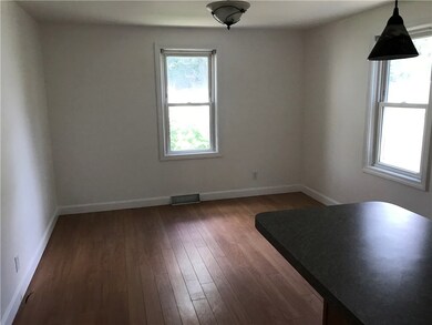 Formal dining room is open to kitchen.