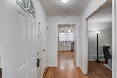 Hallway with light wood finished floors, a texture