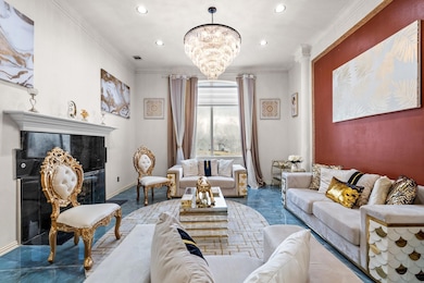 Living area with visible vents, a chandelier, crow