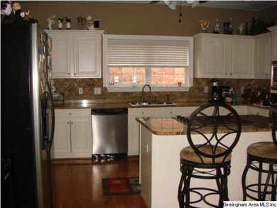 Open kitchen to family room.  Large panty off the 