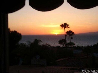 Master bedroom windows provide big views to sunset