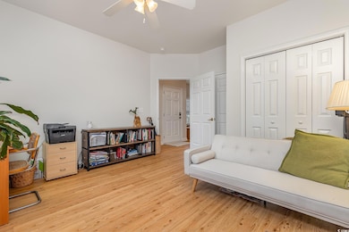 Sitting room featuring hardwood / wood-style floor