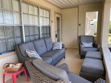 Relax on the front porch & feel the Florida breezes