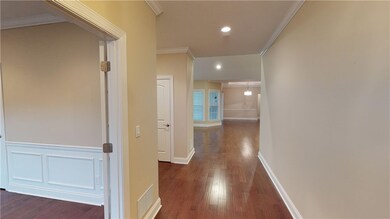 View from the entry finds sparkling hardwood floor