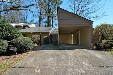 Mid-century inspired home with an attached carport