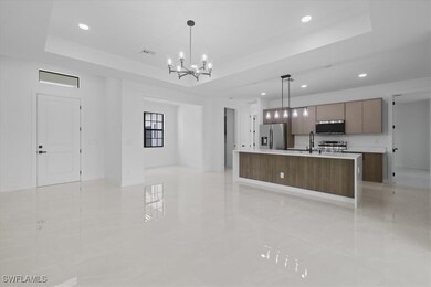 Kitchen with appliances with stainless steel finis