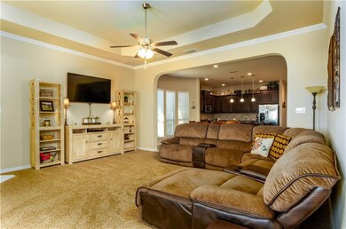 Living Area with Tray Ceiling