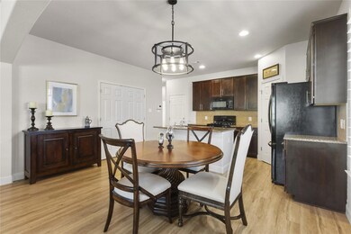 Dining area featuring light wood finished floors 