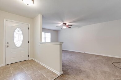 Inviting entryway with New ceramic tile.