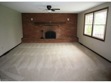 This family room is new, new, new.  New carpet, ne