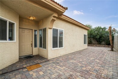 Private entrance finished with pavers.