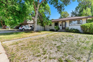 Ranch-style house with a front lawn