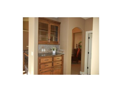 Butler's pantry expands counter & cabinets.