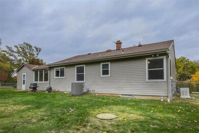 Back of the home.  On the right is a generator for