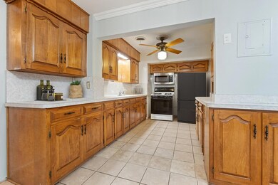 *virtual staging* Kitchen featuring ceiling fan, g