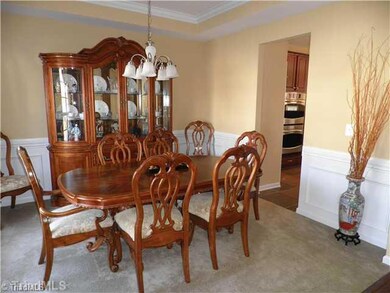 Dining Room. Formal Dining just steps from the Kitchen~ This home has great flowing floor plan perfect for entertaining!
