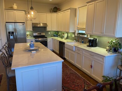 kitchen with gas range and farm sink