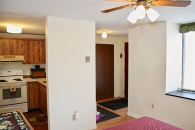 Kitchen and entryway from dining area
