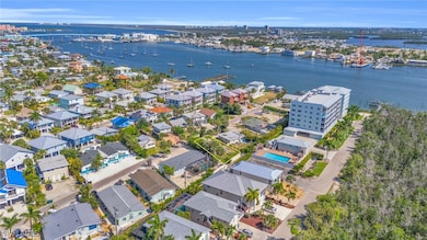 Birds eye view of property with a water view
Lot lines do not represent the survey
Virtually enhanced