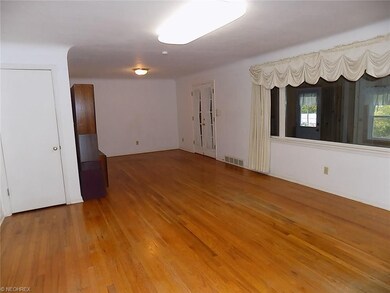 Living & dining room with wood burning fireplace, 
