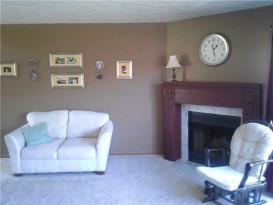 Living Room. Very large open living room with a marble fireplace. Look at the wall of windows that give you a view of the very large deck. Living room opens to the dining room so plenty of room for entertaining