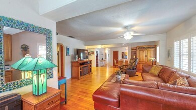 Looking from the office nook all the way back to the dinign area.