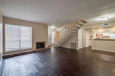 Living room with welcoming fireplace