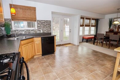Natural light fills the kitchen and dining area.  