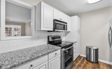 Granite countertops and sleek cabinets!
