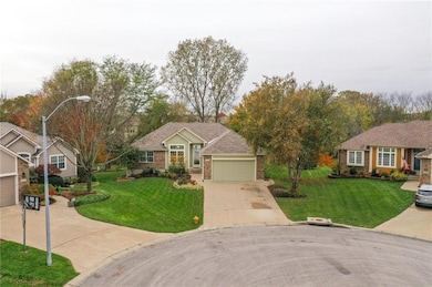 1719 Rolling Rock Rd, Raymore, MO 64083 - photo 2