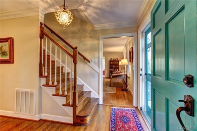 Warm hardwood floors and plenty of light flood the
