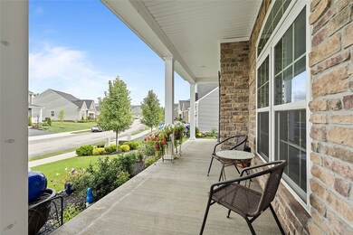 Cozy front porch, perfect for enjoying warm summer