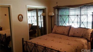 Master bedroom with mirrored  closets