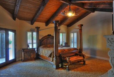 Master bedroom with french doors out.