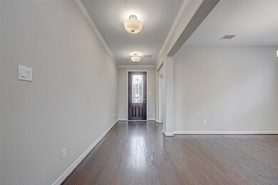 Natural light bellows through the glass door creating a light and bright entry!
