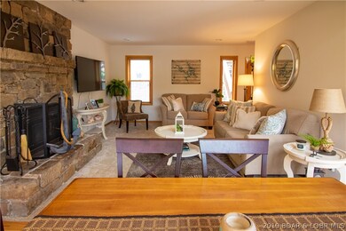 HOME EXEMPLIFIES COMFORTABLE LAKE LIFESTYLE