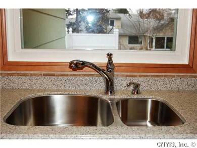 Kitchen Under-mount sink, Corian counter tops